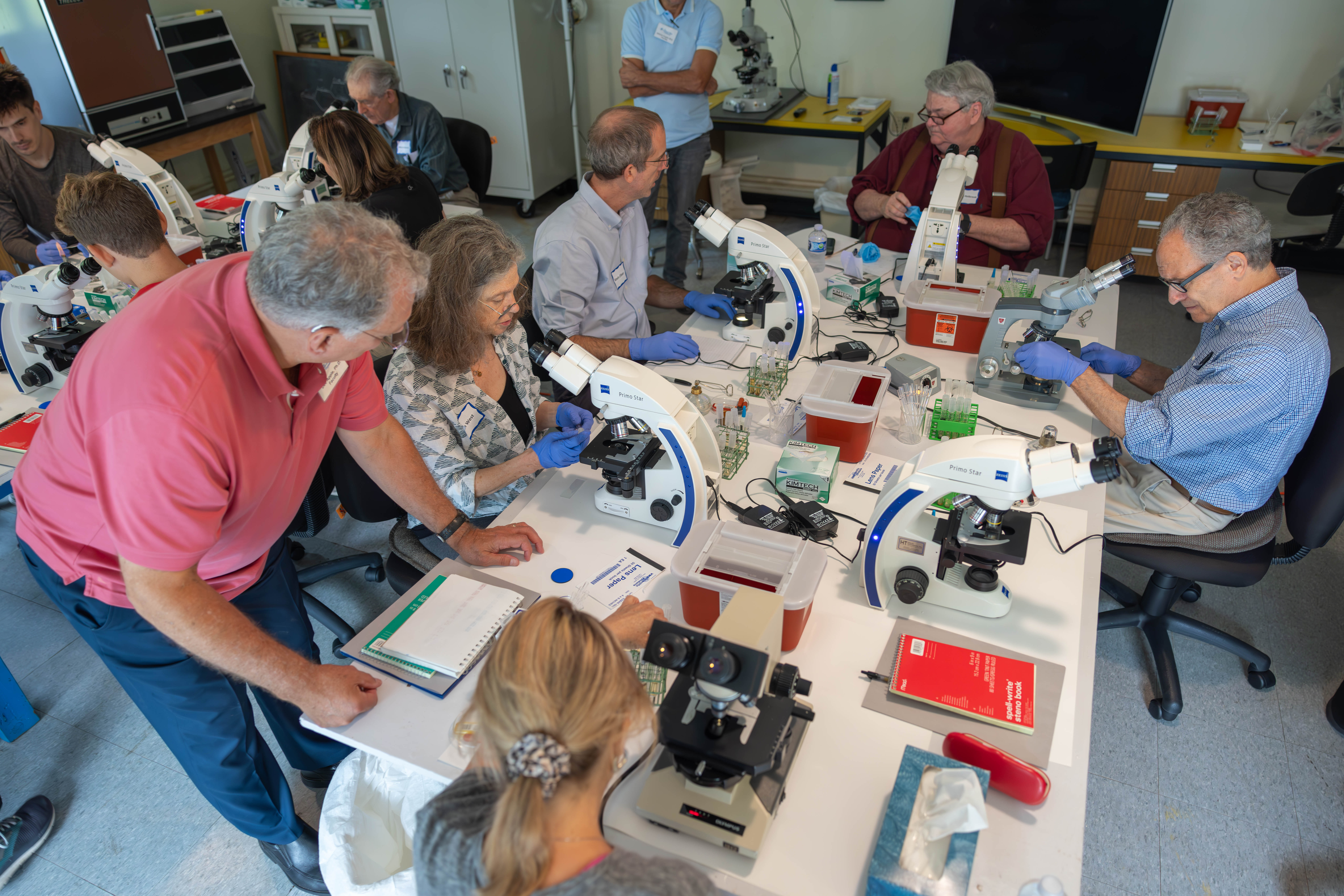 Students and Faculty working in lab.